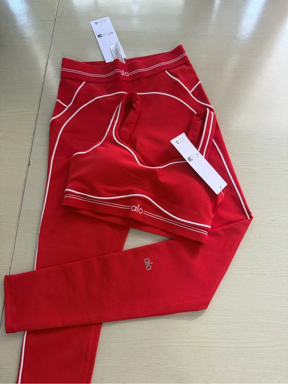 ALO Yoga Red Sports Bra with White Piping